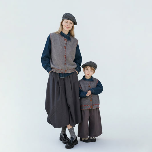 Mum and child sharing a moment in vintage cotton-cashmere knitwear.