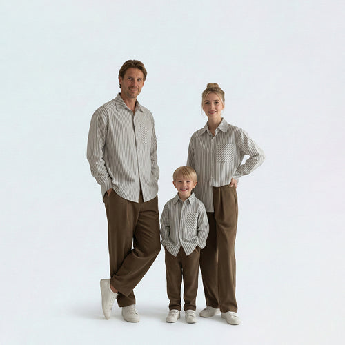 Full family in matching family outfits wearing blue striped cotton shirts for a coordinated Japanese style look.