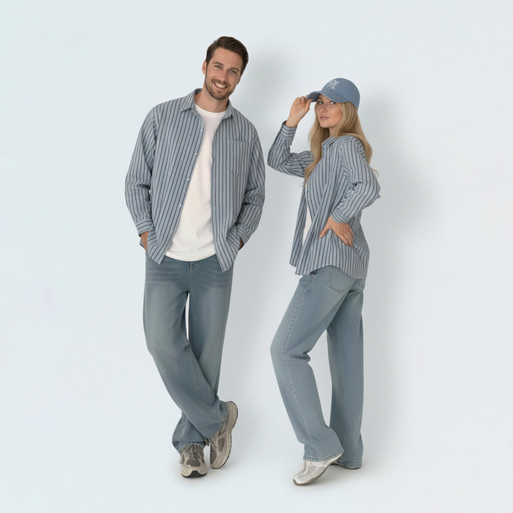 Parents in coordinated matching family outfits, featuring the unisex striped cotton shirt for a relaxed summer vibe.