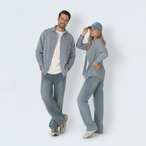 Parents in coordinated matching family outfits, featuring the unisex striped cotton shirt for a relaxed summer vibe.