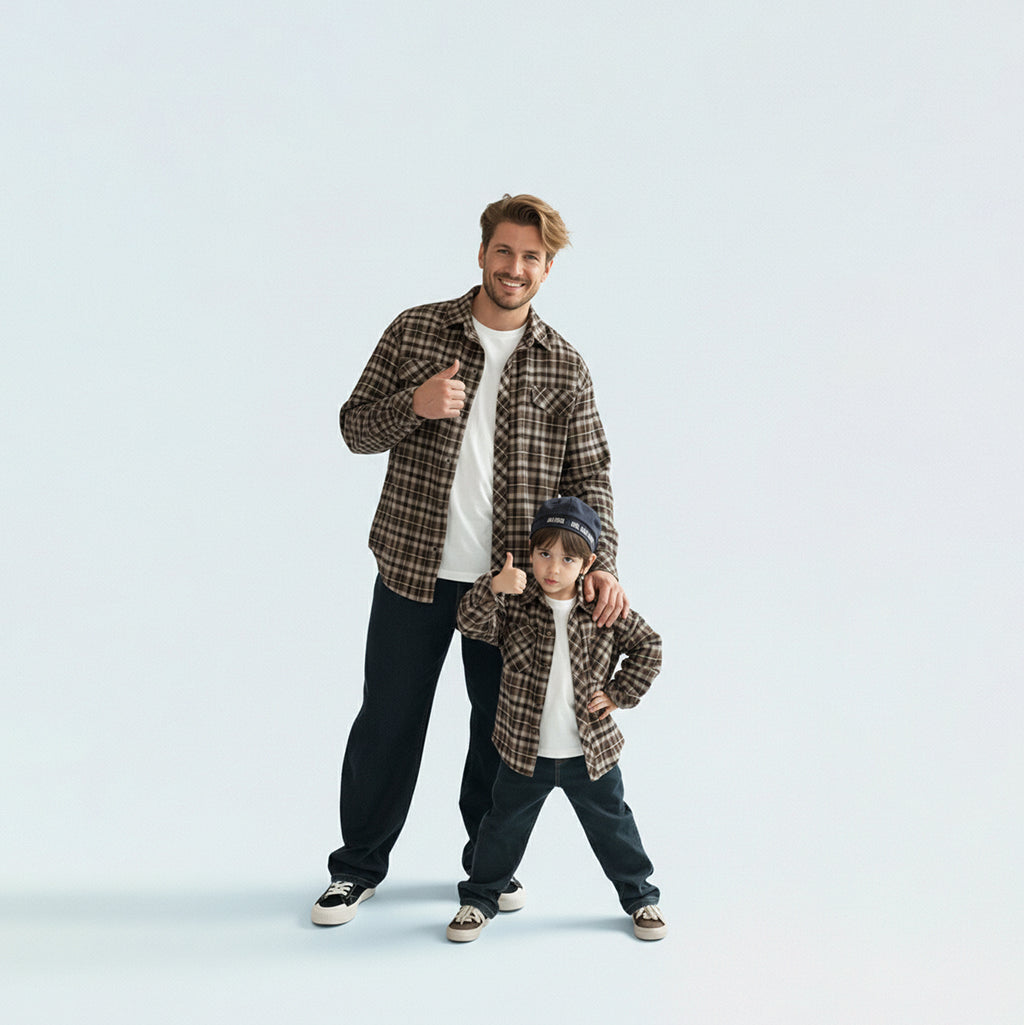 Father and son bonding in matching family outfits wearing comfortable and non-deforming brown plaid shirts.