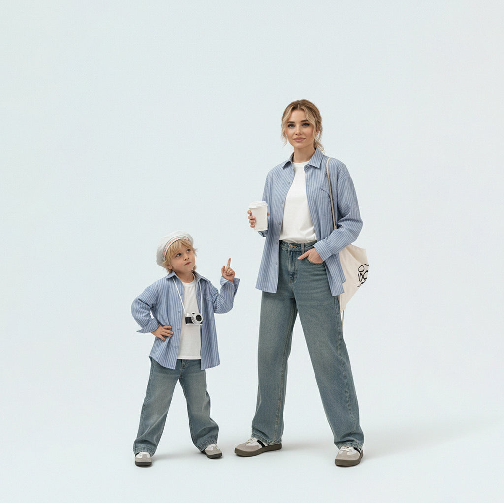 Mother and son in matching family outfits showcasing the stylish sky blue striped cotton shirt mini-me travel style.