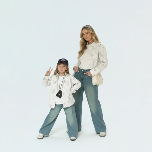 Mother and daughter in matching family outfits showcasing the adorable mini-me sheep print style for spring.