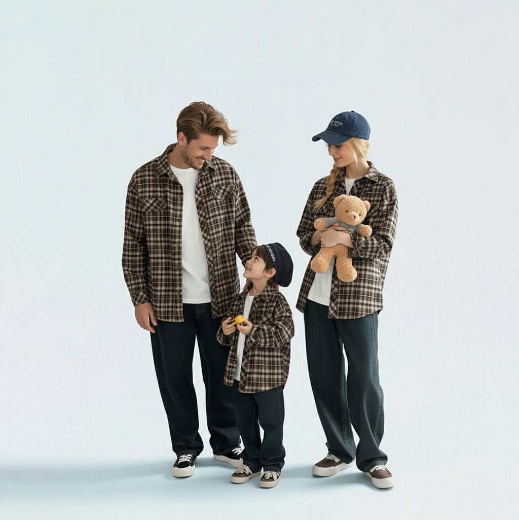 Photo-ready family in matching family outfits, ideal for coordinated rustic family portraits or outdoor reunions.