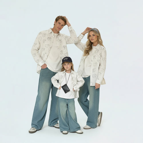 Full family in matching family outfits featuring cute sheep print cotton shirts for a coordinated spring look.