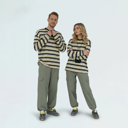 Couple in matching family outfits featuring the unisex contrast striped long sleeve knit tee.