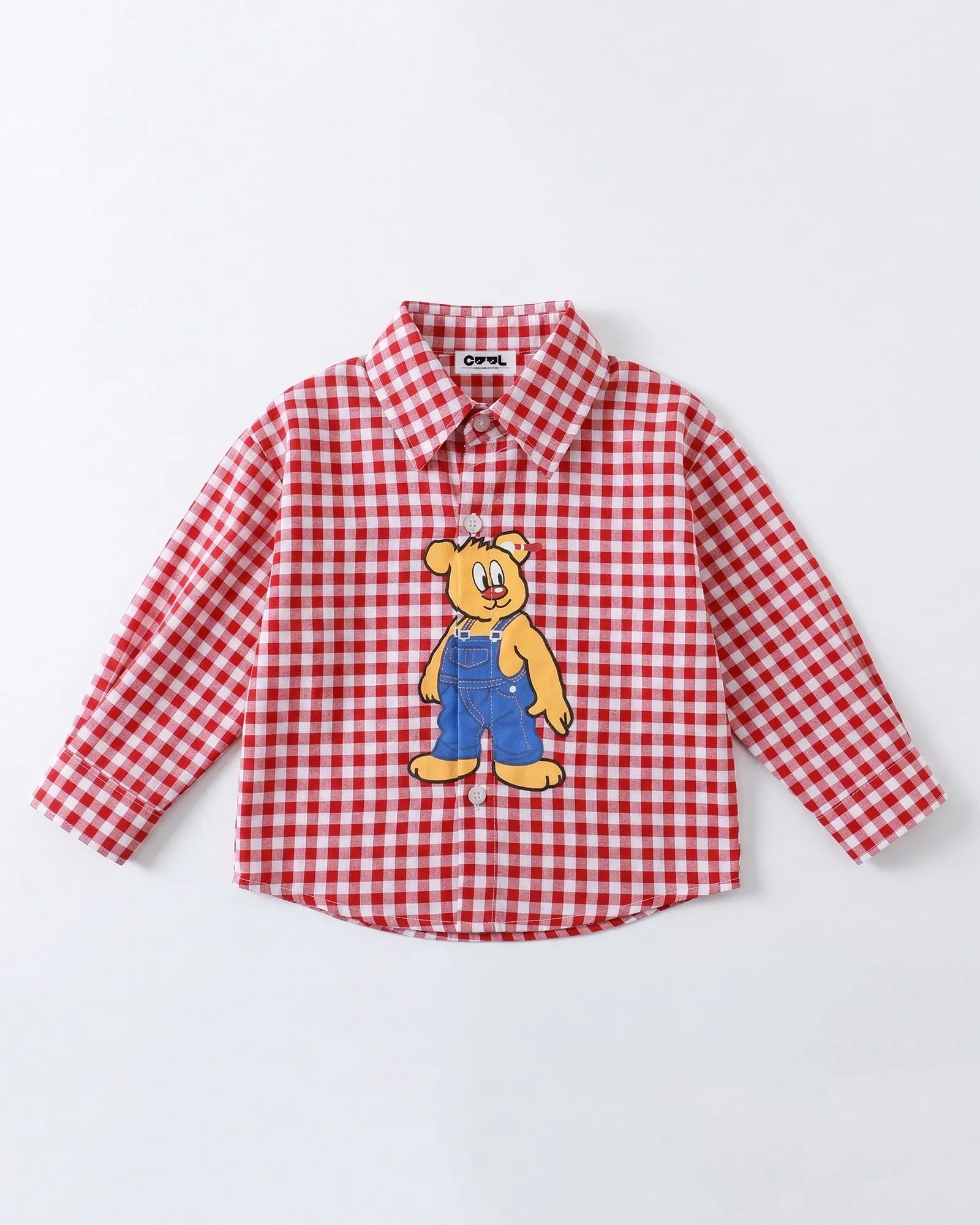 Flat lay of red gingham 100 percent cotton shirt with cartoon bear print detail Melbourne brand.