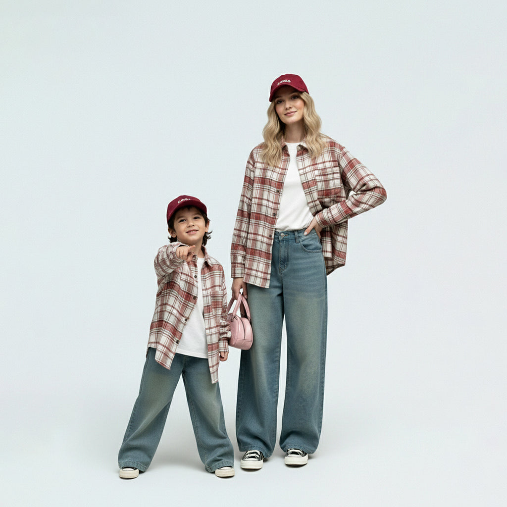 Mother and child in matching family outfits, showcasing the mini-me red plaid shirt style for spring.
