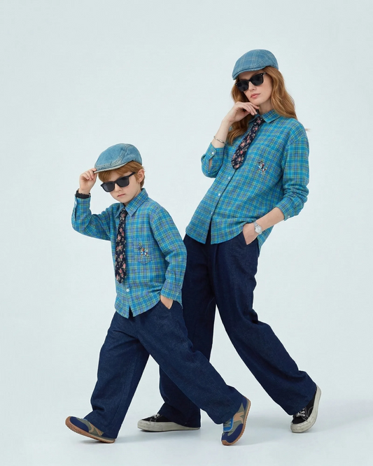 Mother and son posing in blue Korean plaid shirts with floral ties solving the mother-son style gap Melbourne brand.