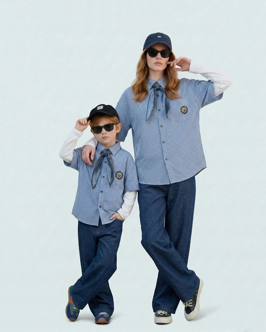 Mother and son posing in blue preppy layered matching shirts solving the mother-son style gap Melbourne brand.
